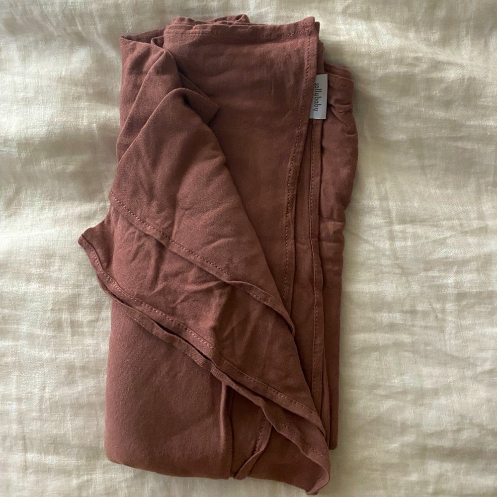 Solly Baby swaddle in mauve